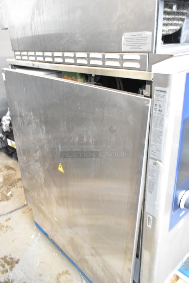 Rational iCombiPro convection oven, stainless steel, electric, 440/480V, 3 phase, model LM100CE.AXXXX. Visible label.