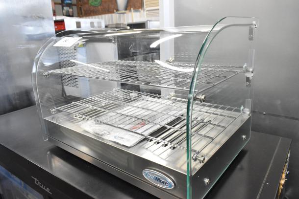Brand new KoolMore HDC-1.5C curved glass countertop display warmer, 115 volts, scratch and dent, dual shelves, stainless steel.