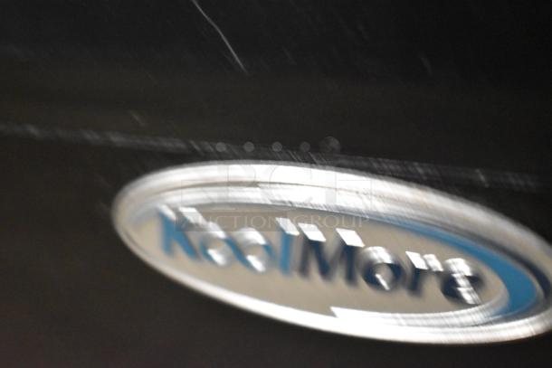 KoolMore logo on a black case, indicating the CDC-3C-BK Countertop Display Refrigerator, showing brand detail.
