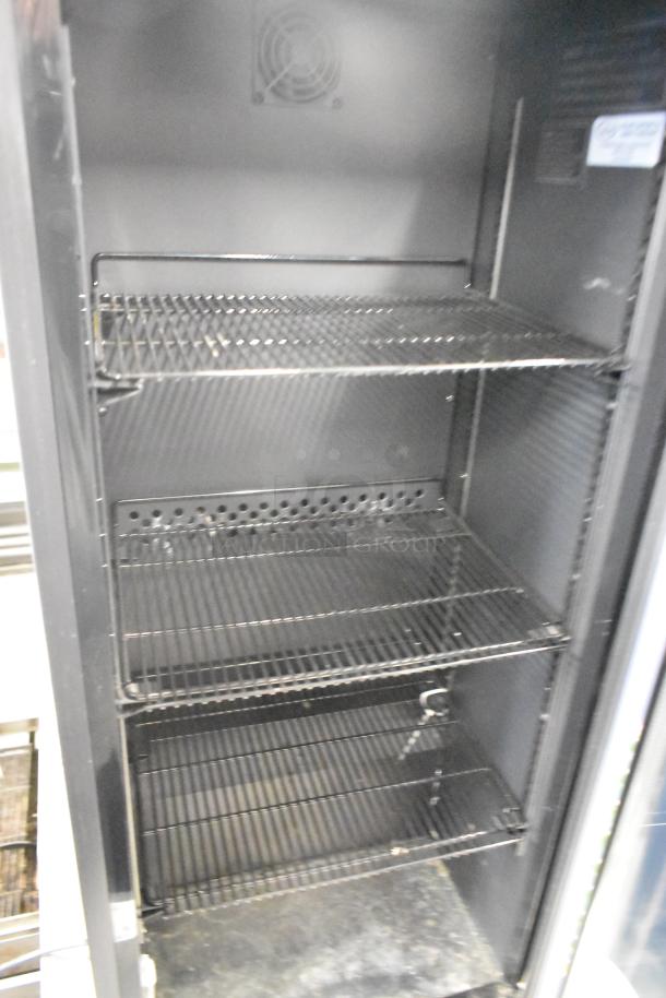 2019 IDW G4-H0234B Metal Mini Cooler Merchandiser, 3 shelves, 110-120V, used condition, ideal for retail display.