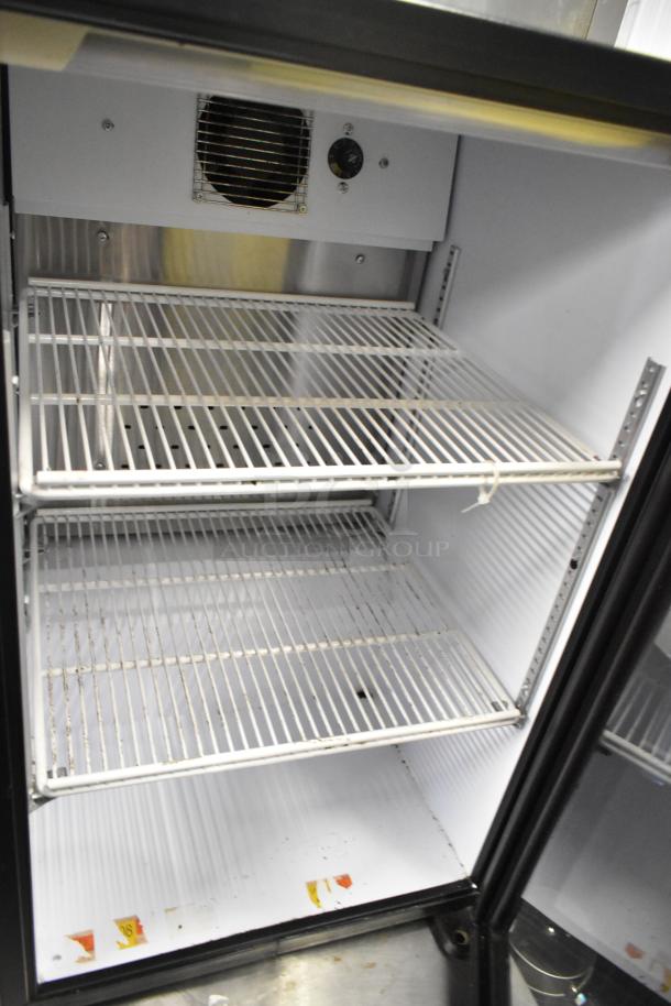 QBD DC6LP Metal Mini Cooler Merchandiser with wire shelves. Model DC6LP, 110-120 Volts, 1 Phase. Interior shelving visible.