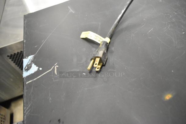 QBD DC6LP Metal Mini Cooler Merchandiser power cord with three-prong plug; cord is tagged "10A max, suitable for appliance."