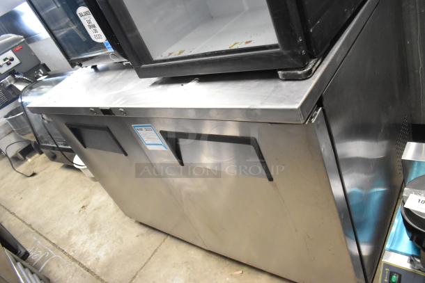 True TUC-48F-LP stainless steel undercounter freezer, 2 doors, 115 volts, 1 phase, commercial use, visible wear.