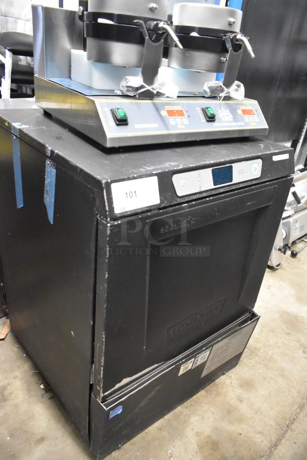 2018 Hobart LXER commercial undercounter dishwasher, black, visible wear, 120/208-240V, 1 phase, control panel intact.