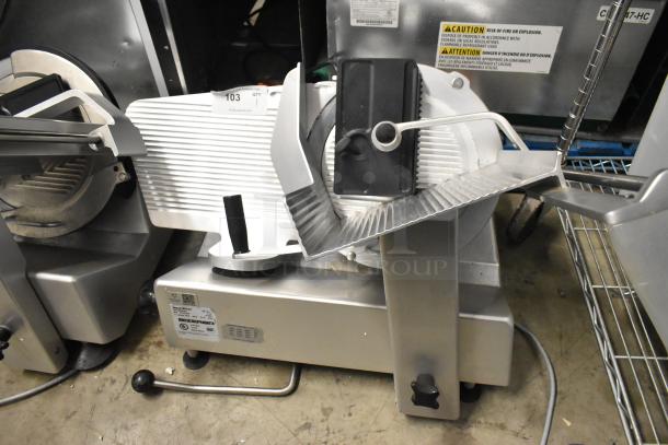 Bizerba SE 12 US metal commercial meat slicer, 120 volts, 1 phase, in good condition with visible brand label and caution sticker.