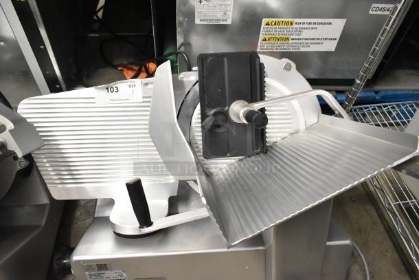 Bizerba SE 12 US metal commercial countertop meat slicer, 120 volts, 1 phase, in good condition with visible safety labels.