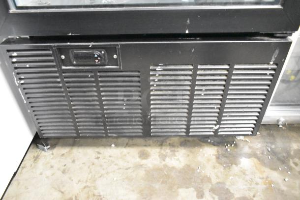 2019 Habco SE18 metal commercial single door reach-in cooler with poly coated racks and front ventilation.