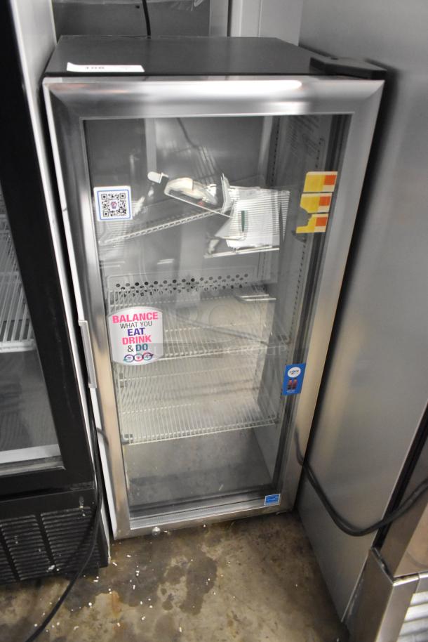 2019 IDW G4-HD234B Metal Mini Cooler Merchandiser, 115V, 1 phase. Features glass door, metal shelves, good condition.
