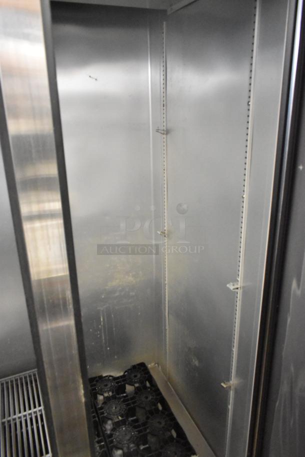 2021 True T-35-HC Stainless Steel 2 Door Reach-In Cooler, interior view, showing poly-coated racks, 115V, 1 Phase.