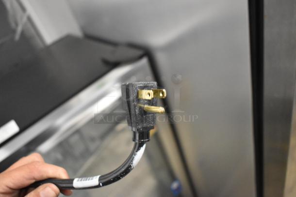 2021 True T-35-HC Stainless Steel 2 Door Reach In Cooler, shown with plug. Poly Coated Racks, 115V, 1 Phase.