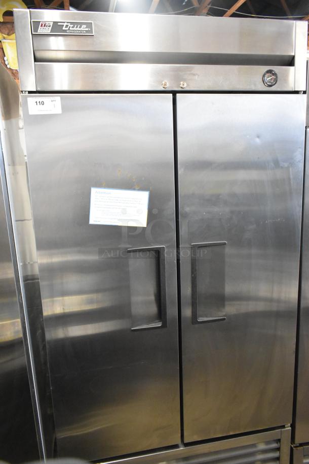 2017 True T-35 stainless steel commercial 2-door cooler, poly-coated racks, on casters, 115V, model T-35, good condition.