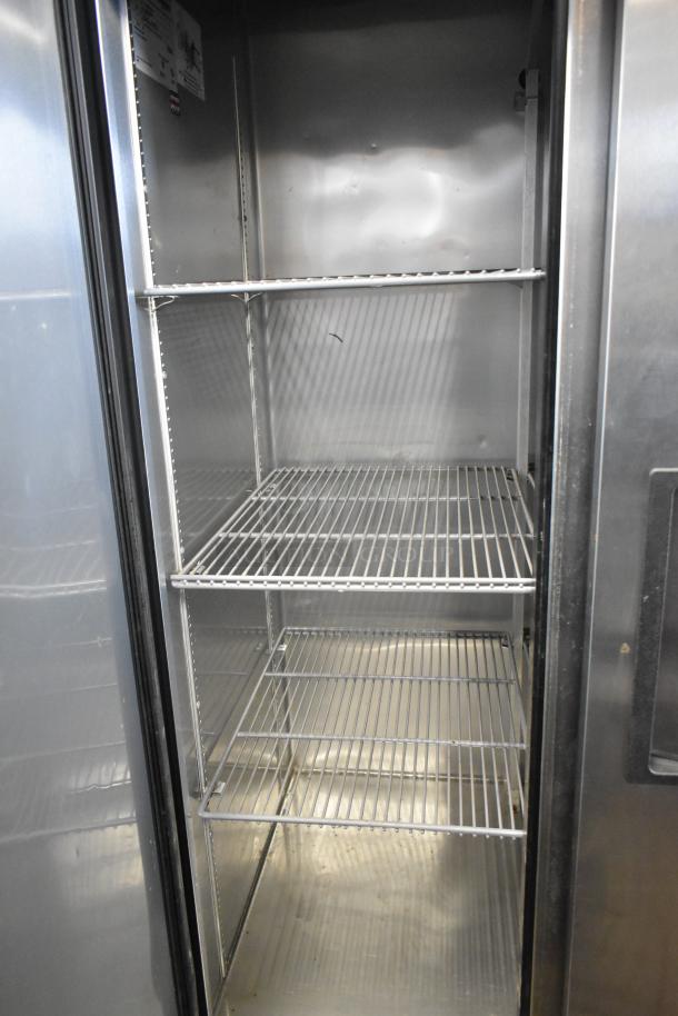 2017 True T-35 stainless steel 2 door reach-in cooler, poly coated racks, commercial casters, 115 volts, 1 phase.