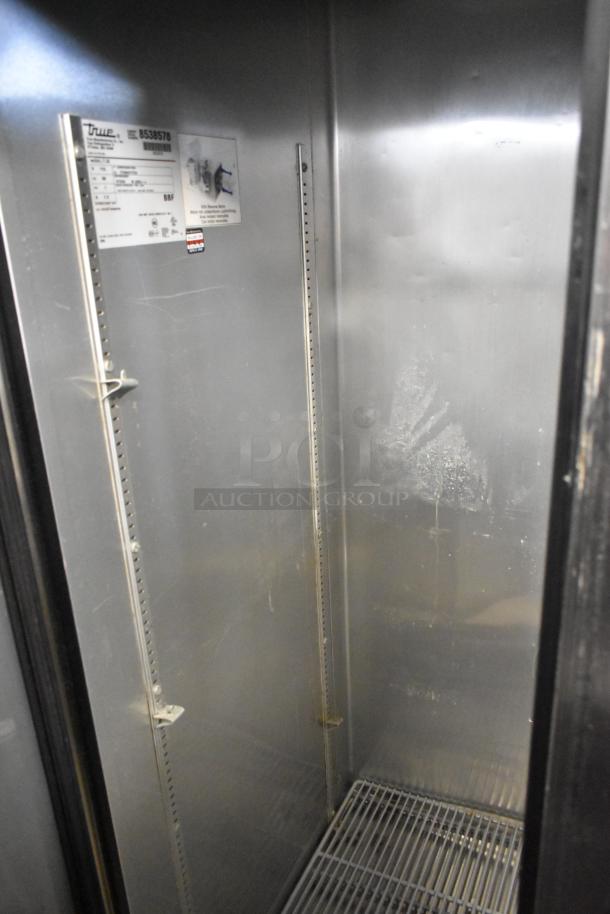 2017 True T-35 commercial 2-door reach-in cooler, stainless steel, poly-coated racks, 115 volts, 1 phase, model plate visible.