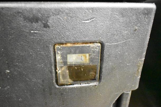 Cambro Black Poly 2 Compartment Heated Holding Cabinet, showing a control panel with visible wear and age-related marks.