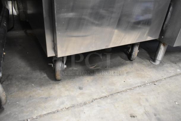 Wittco 1200-2E1ZN stainless steel heated holding cabinet on commercial casters, 208-240V, 1 phase.