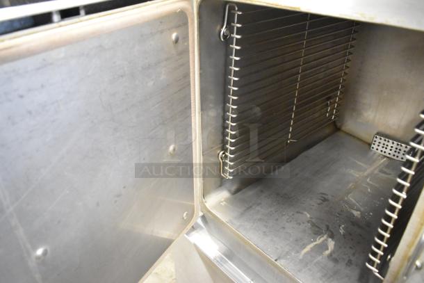 2022 Cleveland 24CGA10 Stainless Steel 2 Deck Steam Cabinet, commercial natural gas powered, showing interior racks.