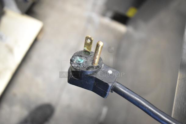 Beverage Air SPE60-16C commercial sandwich prep table plug showing oxidation damage, for 115 volts, 1 phase.