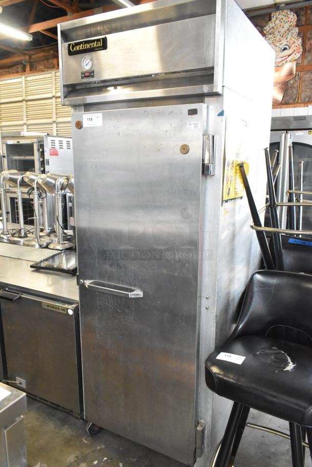 Continental 1FE stainless steel single door freezer with poly-coated racks, on casters. 115V, 1 phase. Used condition.