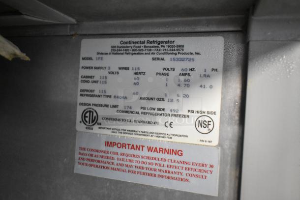 Continental 1FE stainless steel single door reach-in freezer label, showing model, voltage, and refrigerant details.