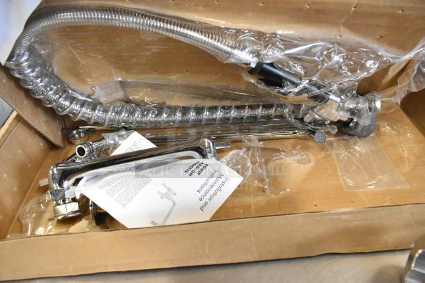 Brand new T&S Equip faucet in box, minor scratches, includes flexible hose and installation instructions.