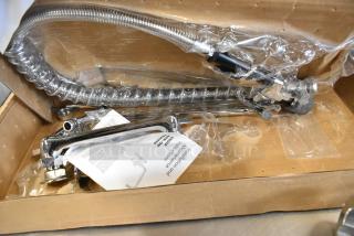 Brand new T&S Equip faucet in box, minor scratches, includes flexible hose and installation instructions.