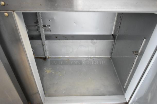 Beverage Air UCR72AY-23 stainless steel undercounter cooler interior, 3-door, 115V, 1 phase, minor wear, adjustable shelving.