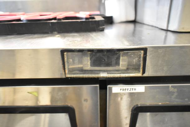 2016 Atosa MGF8406 stainless steel 2-door undercounter freezer with commercial casters, visible "Freezer" label.