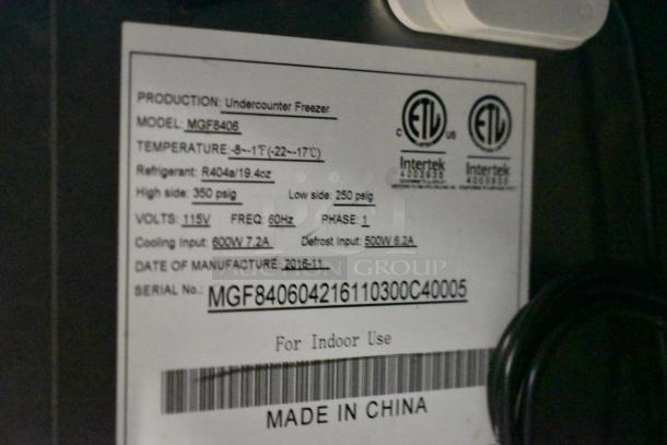 2016 Atosa MGF8406 commercial freezer label, showing model, voltage (115V), phase (1), temperature range, and serial number.