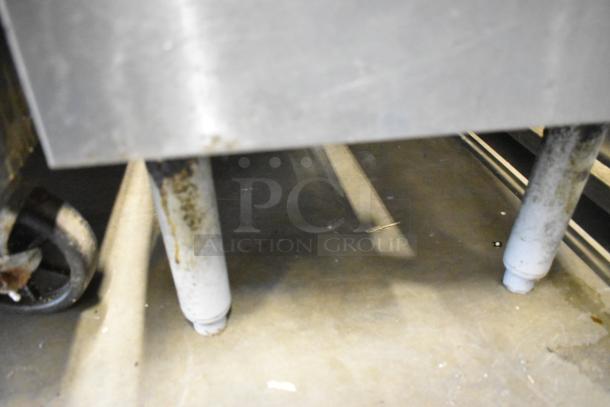 Pitco Frialator SG14T stainless steel fryer base and legs, natural gas, 100,000 BTU, shows signs of use.