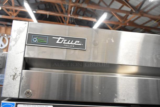 2022 True T-19F-HC stainless steel commercial freezer. Single door, 115 volts, 1 phase, natural refrigerant label.
