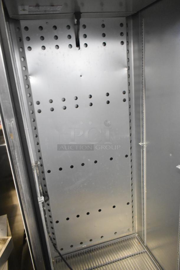 2022 True T-19F-HC single door stainless steel freezer interior, perforated shelf support design, excellent condition.