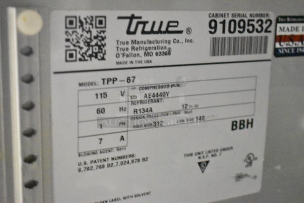 2017 True TPP-67 stainless steel commercial pizza prep table, 115V, on casters. Label details model and serial number.