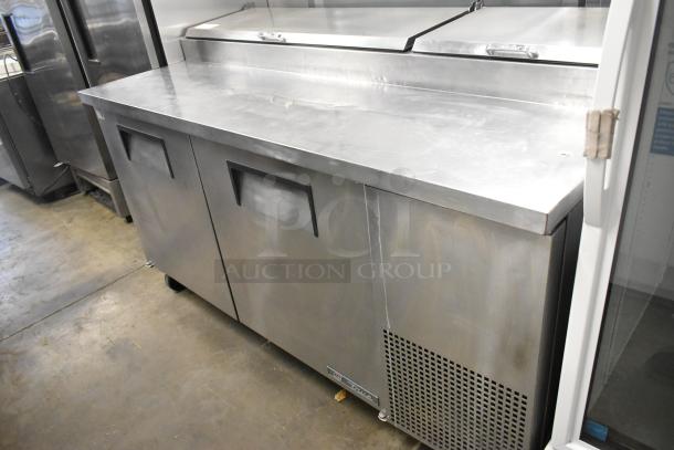 2017 True TPP-67 stainless steel pizza prep table, commercial casters, 115V, excellent condition.