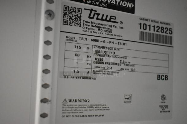 Label close-up of True TSCI-600R-G-PH Cooler. Shows specs: 115 Volts, 1 Phase, R290 Refrigerant, Serial No. 10112825.