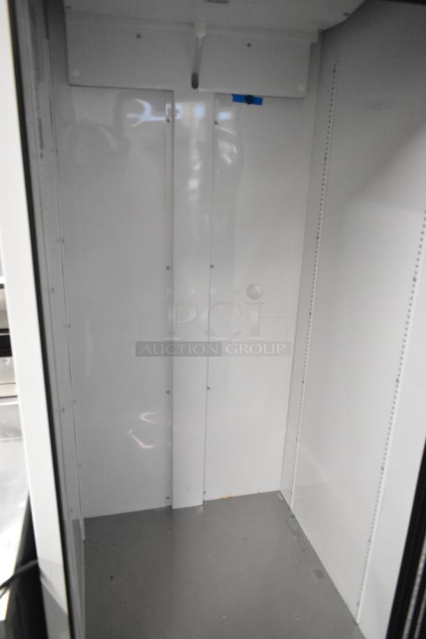 2021 True TSCI-600R-G-PH single door reach-in cooler, metal interior, excellent condition, 115 volts, commercial use.
