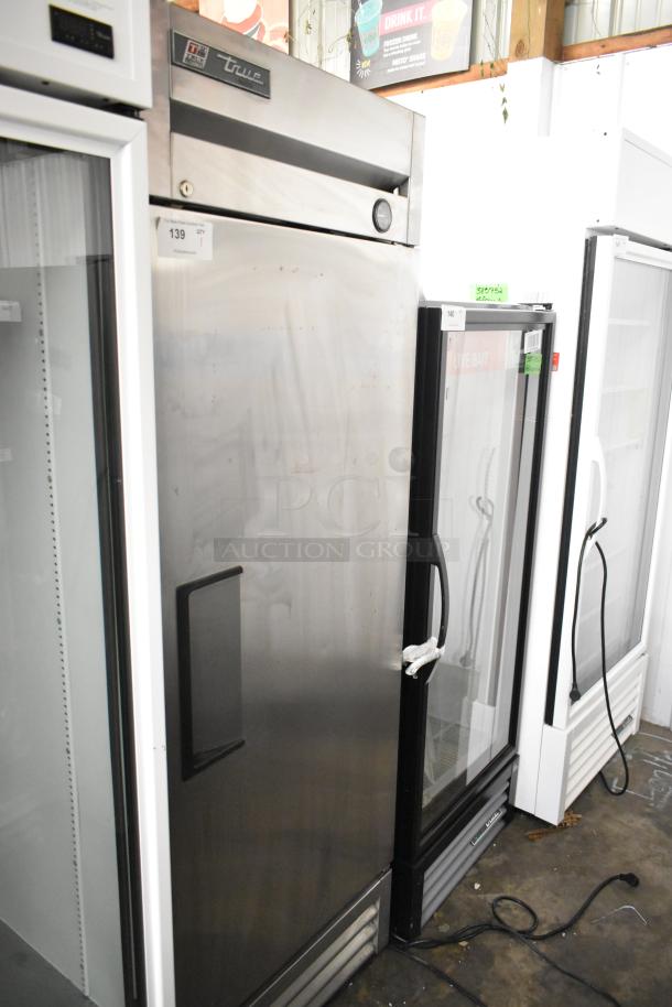 2017 True T-19F Stainless Steel Commercial Freezer, single door, poly coated racks, 115V, 1 Phase. Visible True branding.