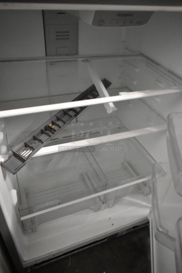 2018 Maytag WRT311FZDM01 stainless steel fridge with freezer, 115V, 1-phase. Interior shelves and bins visible, in good condition.