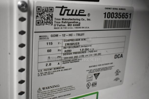 2020 True GDM-12-HC single door cooler, 115 volts, 1 phase, metal, with poly coated racks, serial number 10035651.