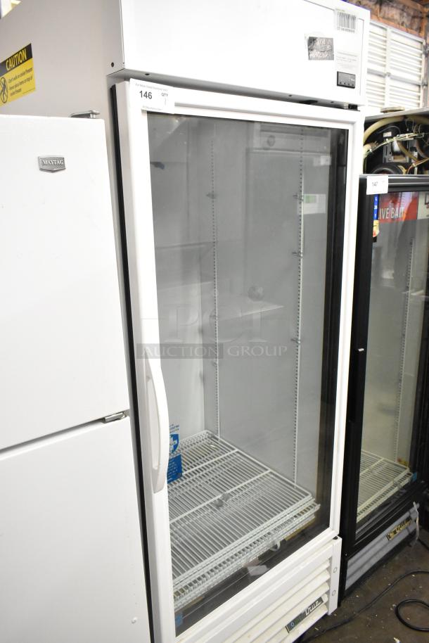 2021 True TSCI-600R-G-PH single door cooler, glass door, poly-coated racks, 115 volts, clean, with auction label.
