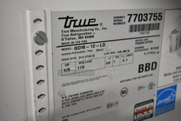 True GDM-12-LD cooler label, showing model, voltage 115V, 1 phase, serial number 7703755, and NSF certification.