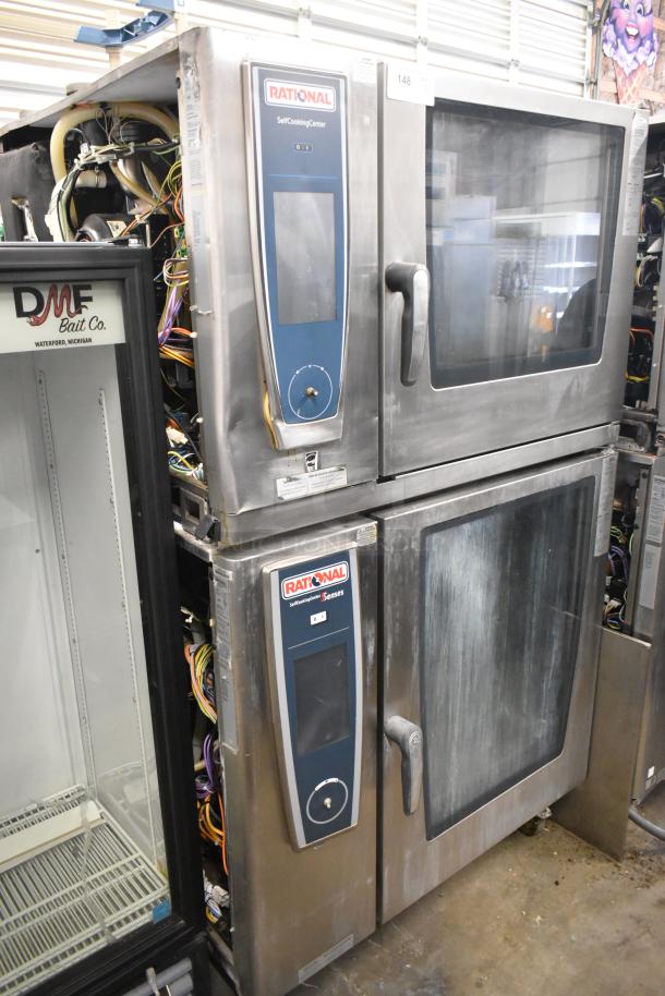 Two 2019 Rational SCCWE62/SCCWE102 SelfCookingCenter convection ovens, stainless steel, electric, 480V, 3-phase, visible wiring.