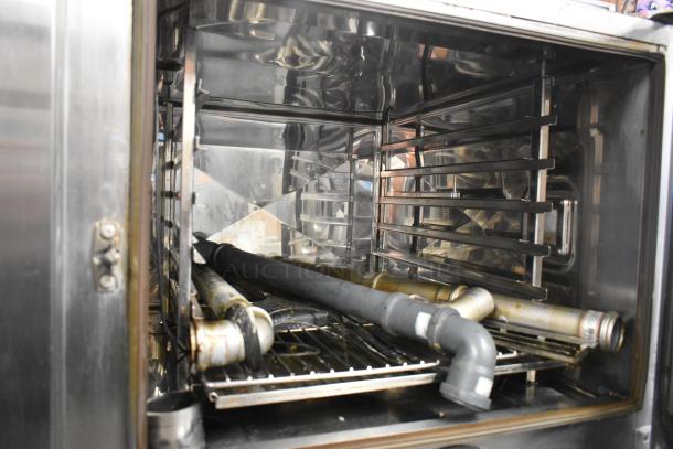 2019 Rational SCCWE62/SCCWE102 stainless steel convection oven interior, electric, 480V, 3-phase, for commercial use.