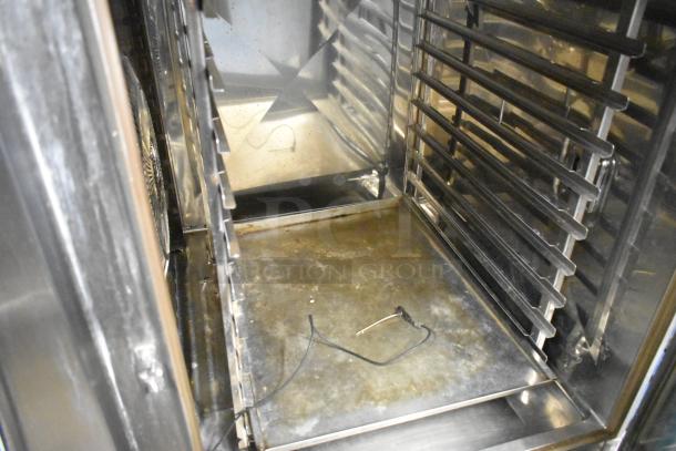 2019 Rational SCCWE SelfCookingCenter stainless steel commercial convection oven interior, showing racks and wiring.
