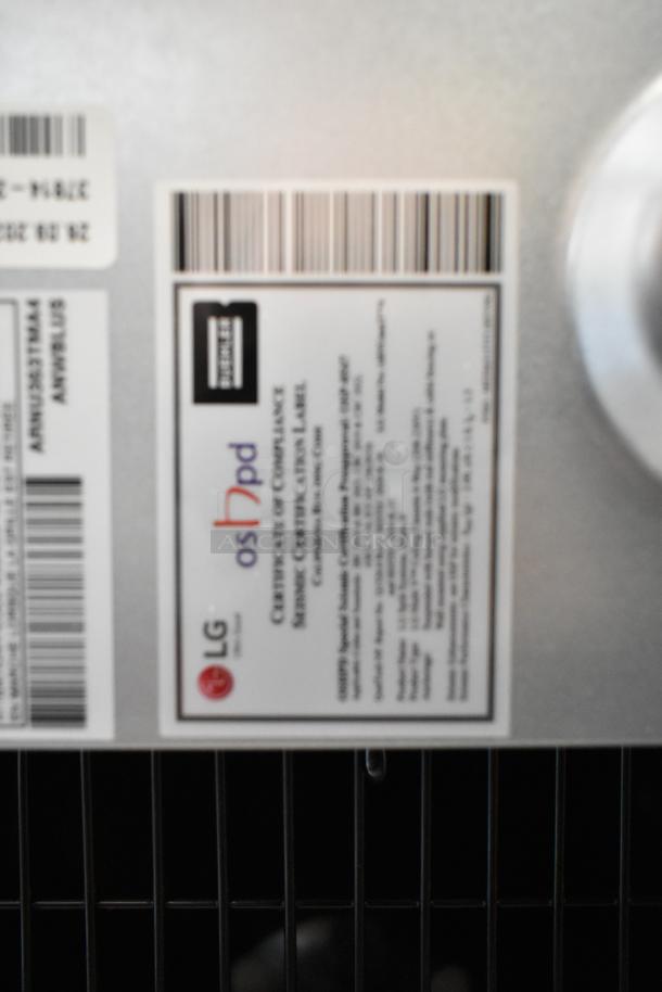 LG ARNU363TMA4 evaporator fan, metal, 208/230V, 1 phase. Features compliance label and barcodes. Commercial use.