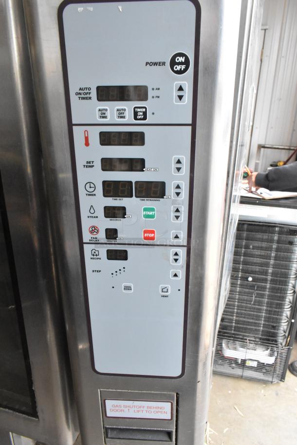 Baxter OV310G stainless steel commercial gas oven, 95,000 BTU, with control panel and double pan rack on casters.