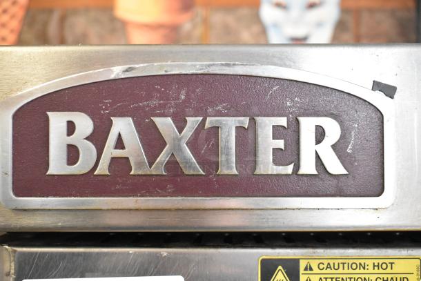 Baxter OV310G stainless steel commercial gas oven, 95,000 BTU. Features rotating rack, double pan rack, on casters.