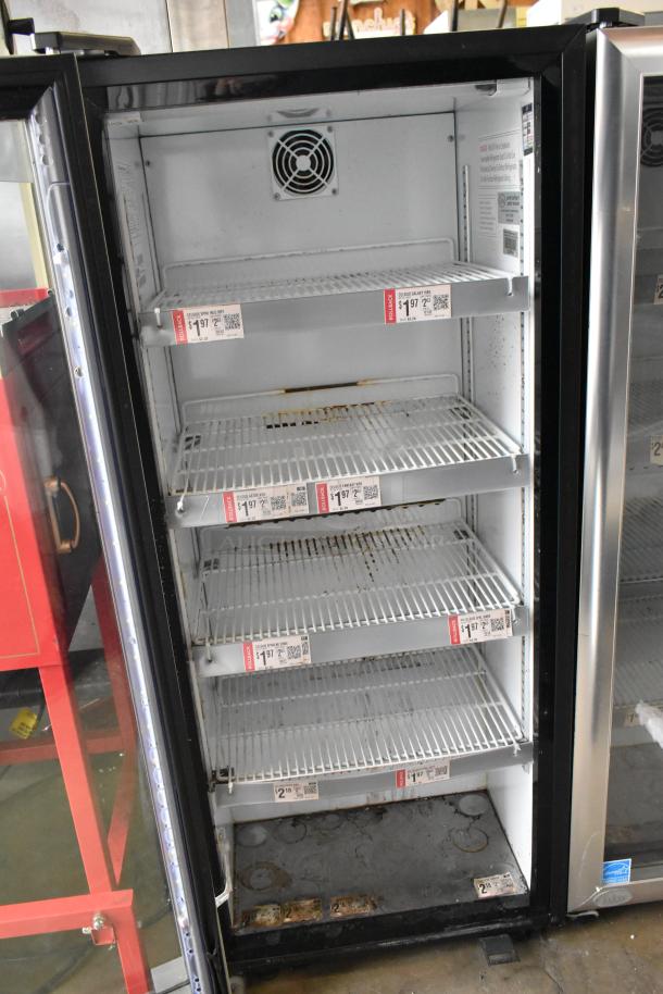 2021 IDW G4-H0234B Metal Mini Cooler Merchandiser, 110-120V, 1 Phase. Features wire shelves and interior fan. Some wear visible.