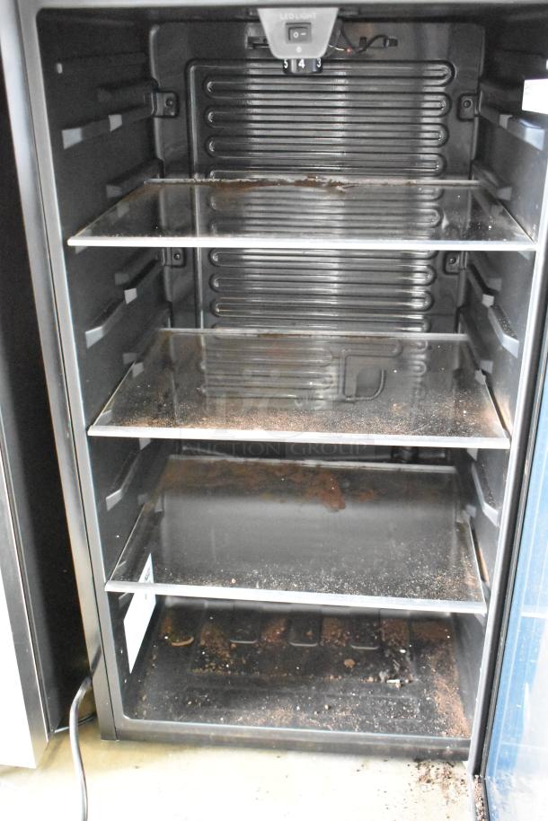 Arctic King ARV115B1AST metal mini cooler, 110-120V, 1 phase. Visible wear, five shelves, LED light, internal thermostat.