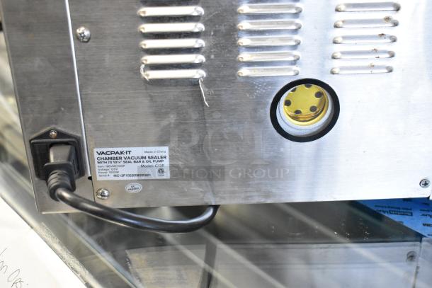 VacPak-It 186VMC10OP chamber vacuum sealer, stainless steel, with 10 1/4" seal bar and oil pump. Label shows specs and power cord.