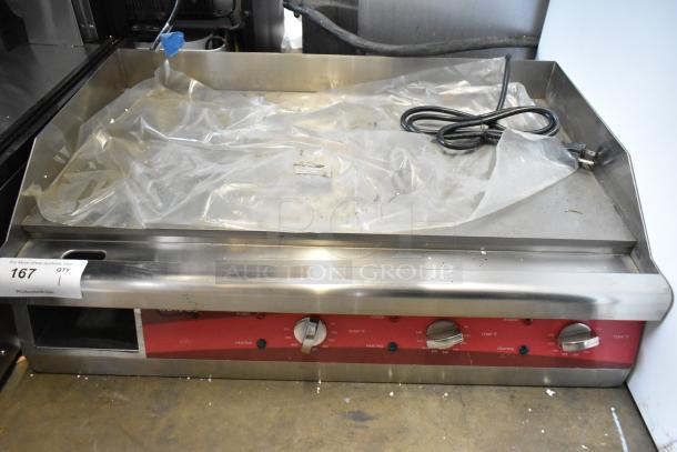 Brand new Avantco 177EG30N 30" stainless steel electric countertop griddle with thermostatic controls, 208/240V, 1 phase.